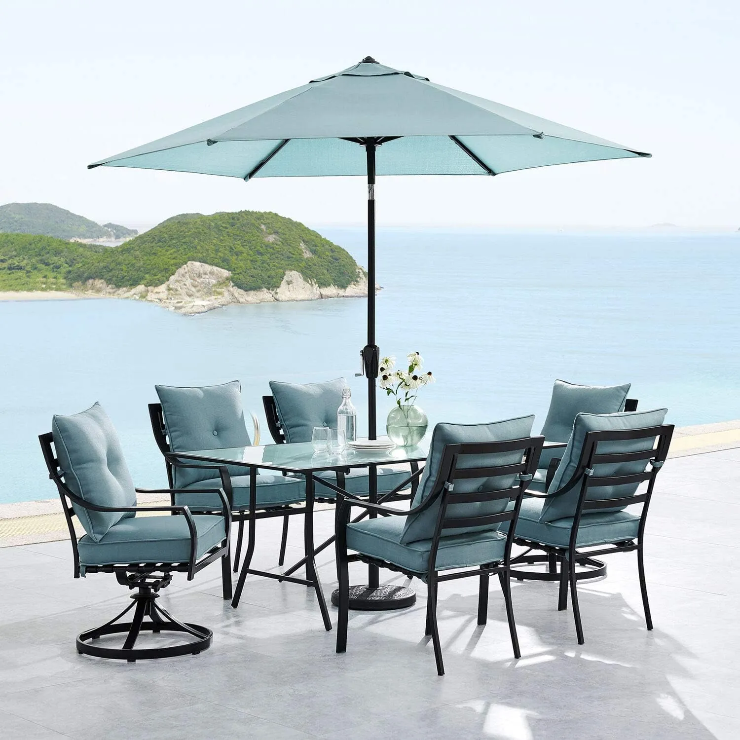 Hanover Lavallette 7-Piece Modern Outdoor Dining Set with Umbrella, 6 Cushioned Swivel Rocker Chairs, 66'' x 38'' Glass-Top Table, and Weather Resistant Frames, in Ocean Blue