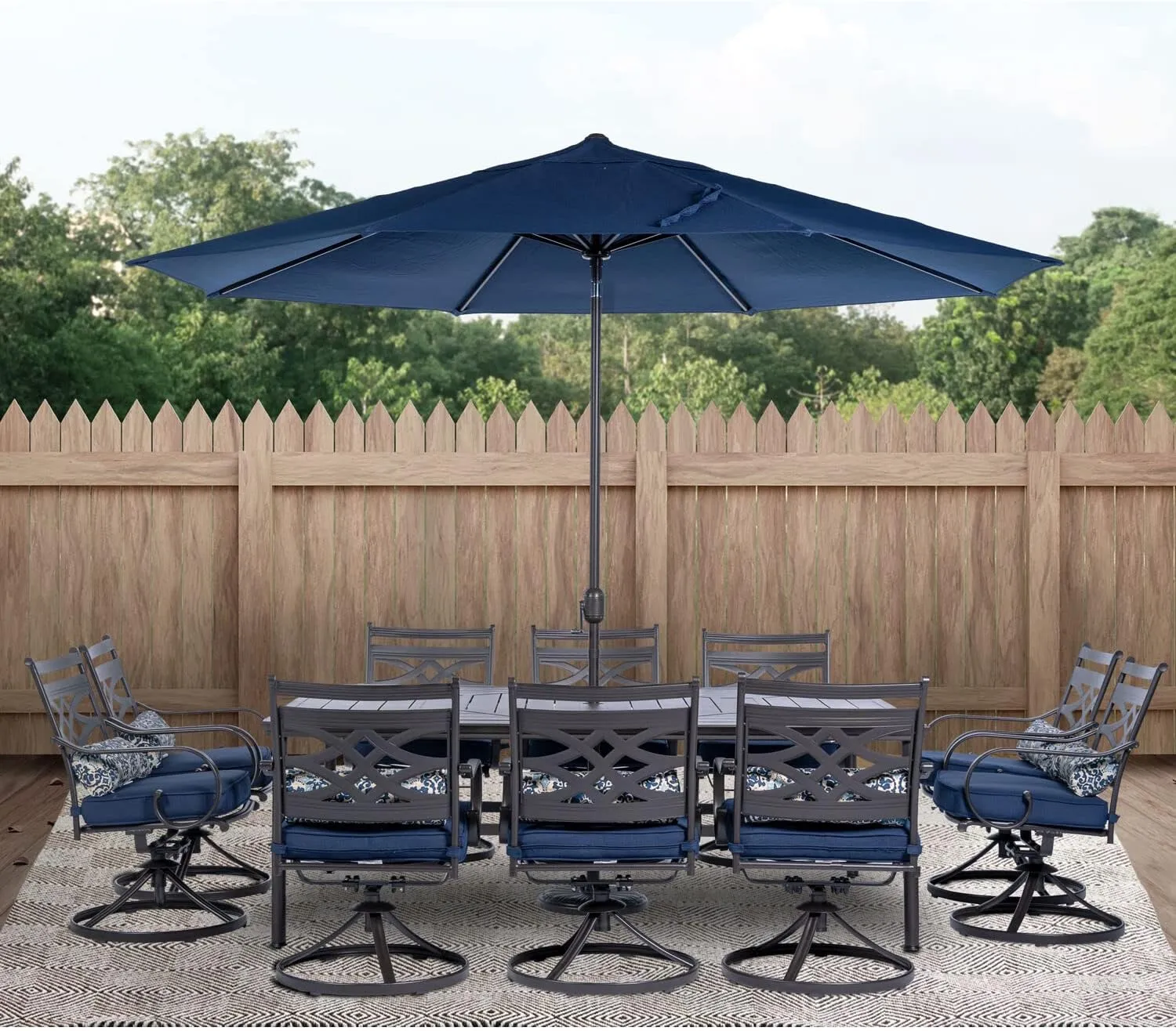 Hanover Montclair 11-Piece Outdoor Dining Set, All-Weather Outdoor Patio Dining Set, 10 Swivel Rocker Chairs with Seat and Lumbar Cushions, 84"x60" Stamped Rectangle Table, Umbrella, and Umbrella Base