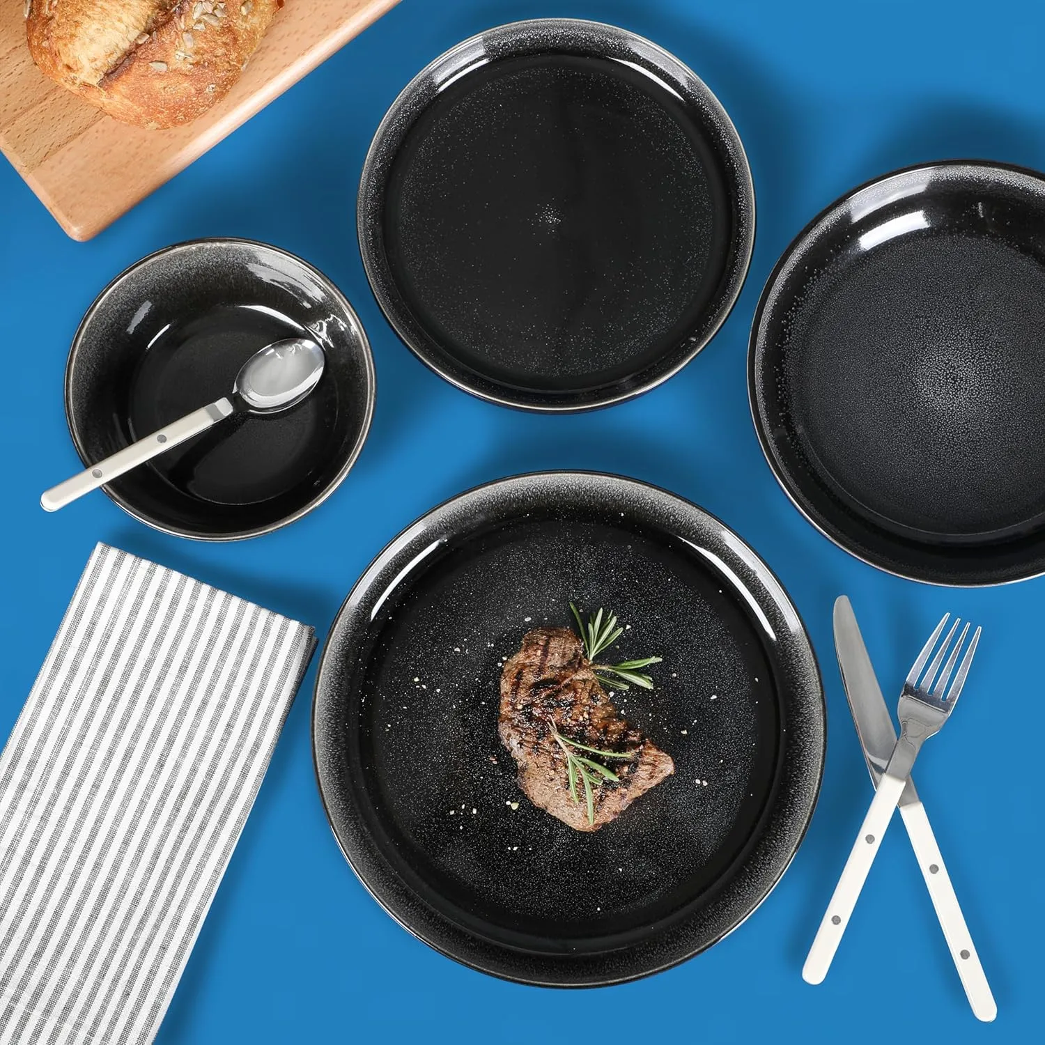 Sur La Table Kitchen Essentials Banquette 16 Piece Double Bowl Plates and Bowls Reactive Glaze Stoneware Dinnerware Set - Black