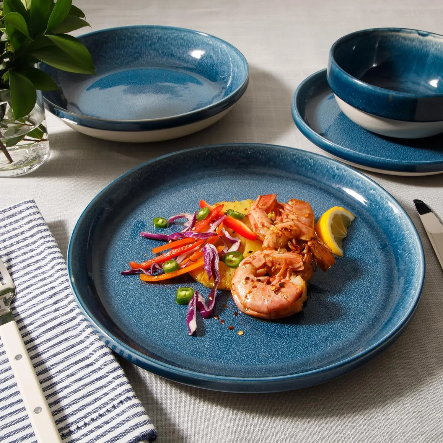 Sur La Table Kitchen Essentials Banquette 16 Piece Double Bowl Plates and Bowls Reactive Glaze Stoneware Dinnerware Set - Blue