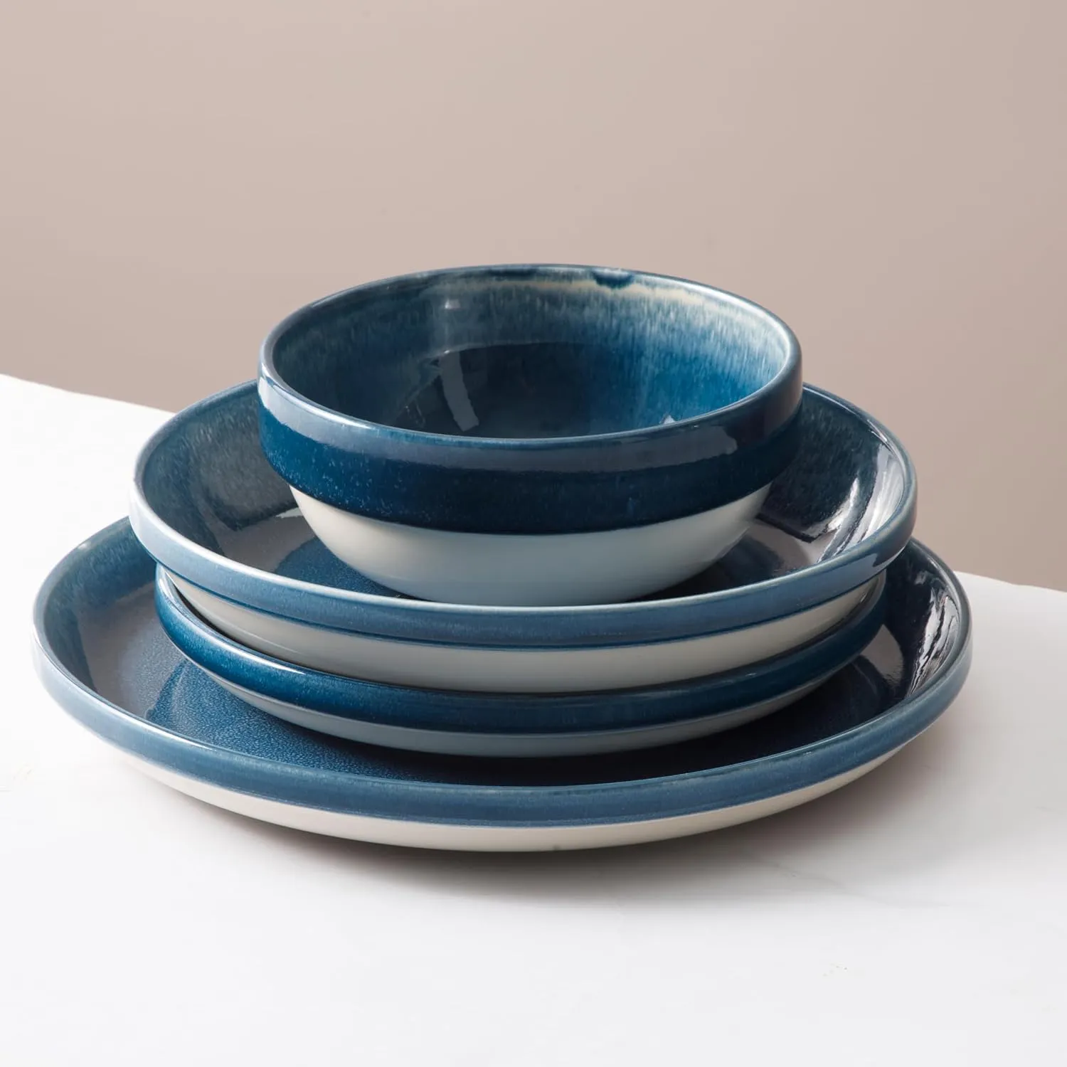 Sur La Table Kitchen Essentials Banquette 16 Piece Double Bowl Plates and Bowls Reactive Glaze Stoneware Dinnerware Set - Blue