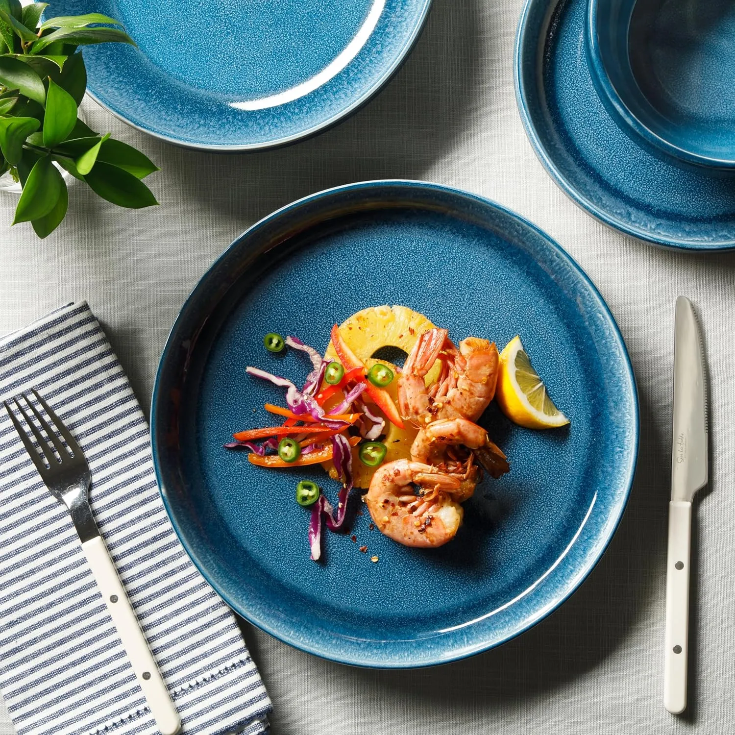 Sur La Table Kitchen Essentials Banquette 16 Piece Double Bowl Plates and Bowls Reactive Glaze Stoneware Dinnerware Set - Blue