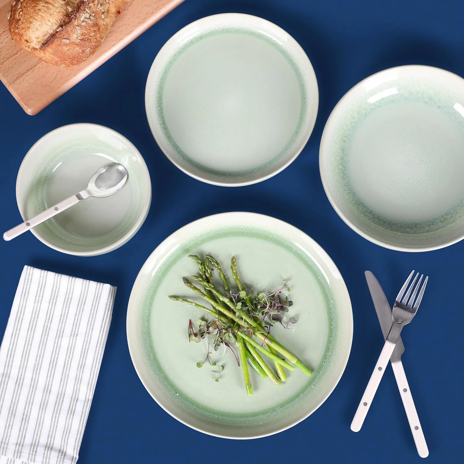 Sur La Table Kitchen Essentials Banquette 16 Piece Double Bowl Plates and Bowls Reactive Glaze Stoneware Dinnerware Set - Green