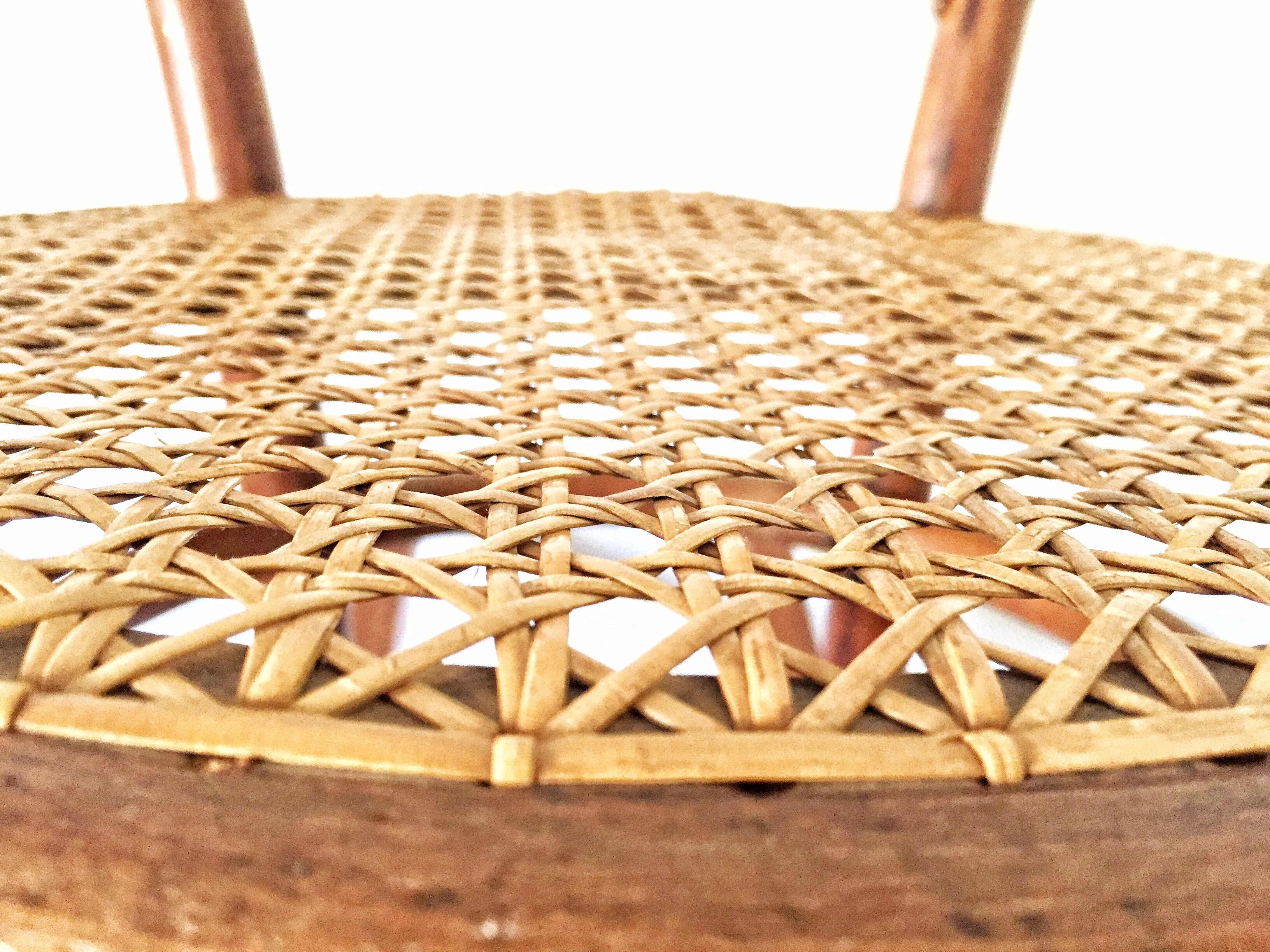 Vintage child’s bentwood rocker chair with woven wicker seat
