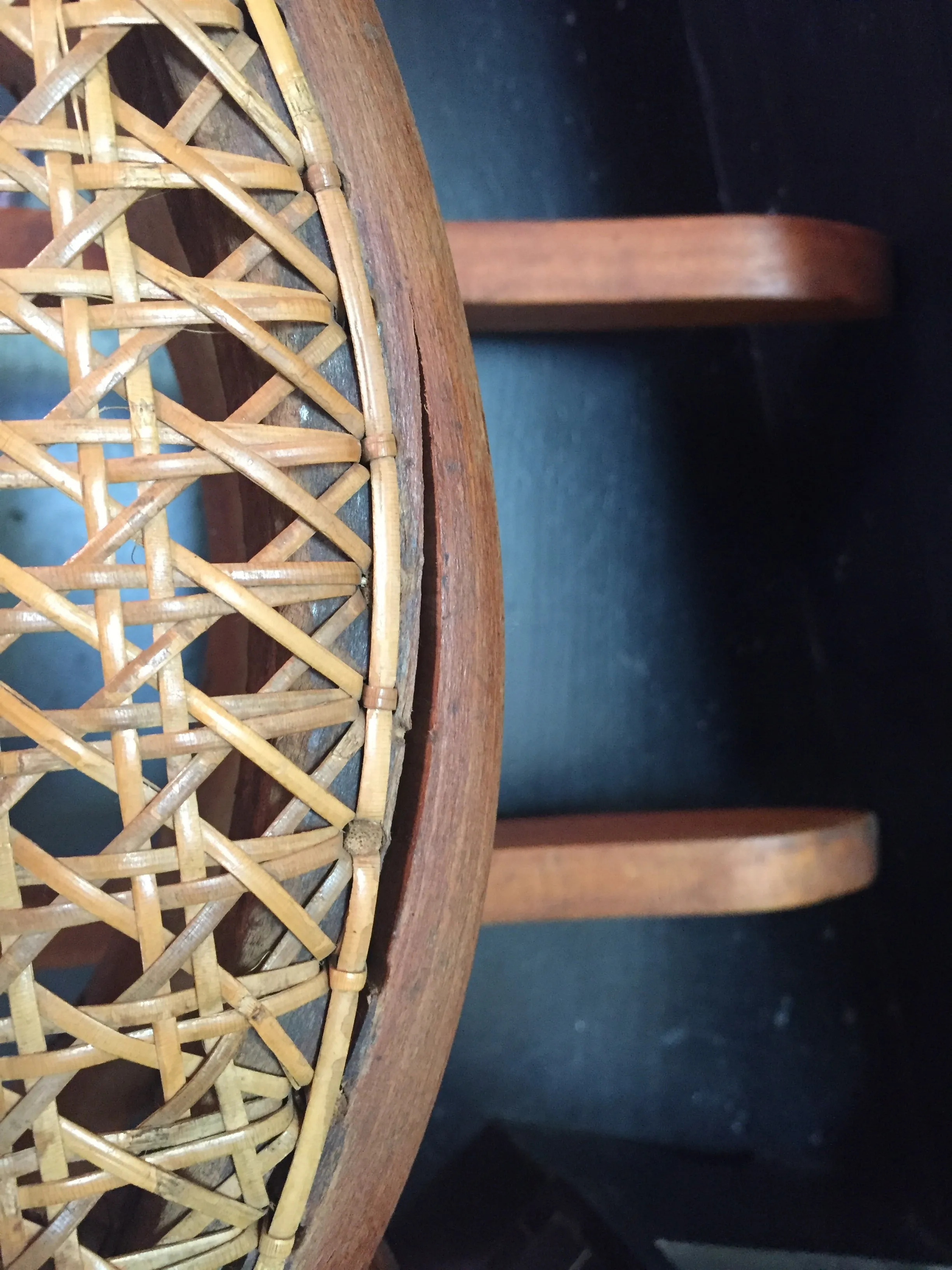 Vintage child’s bentwood rocker chair with woven wicker seat
